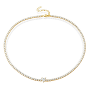 Gold necklace with clear stones on a white background